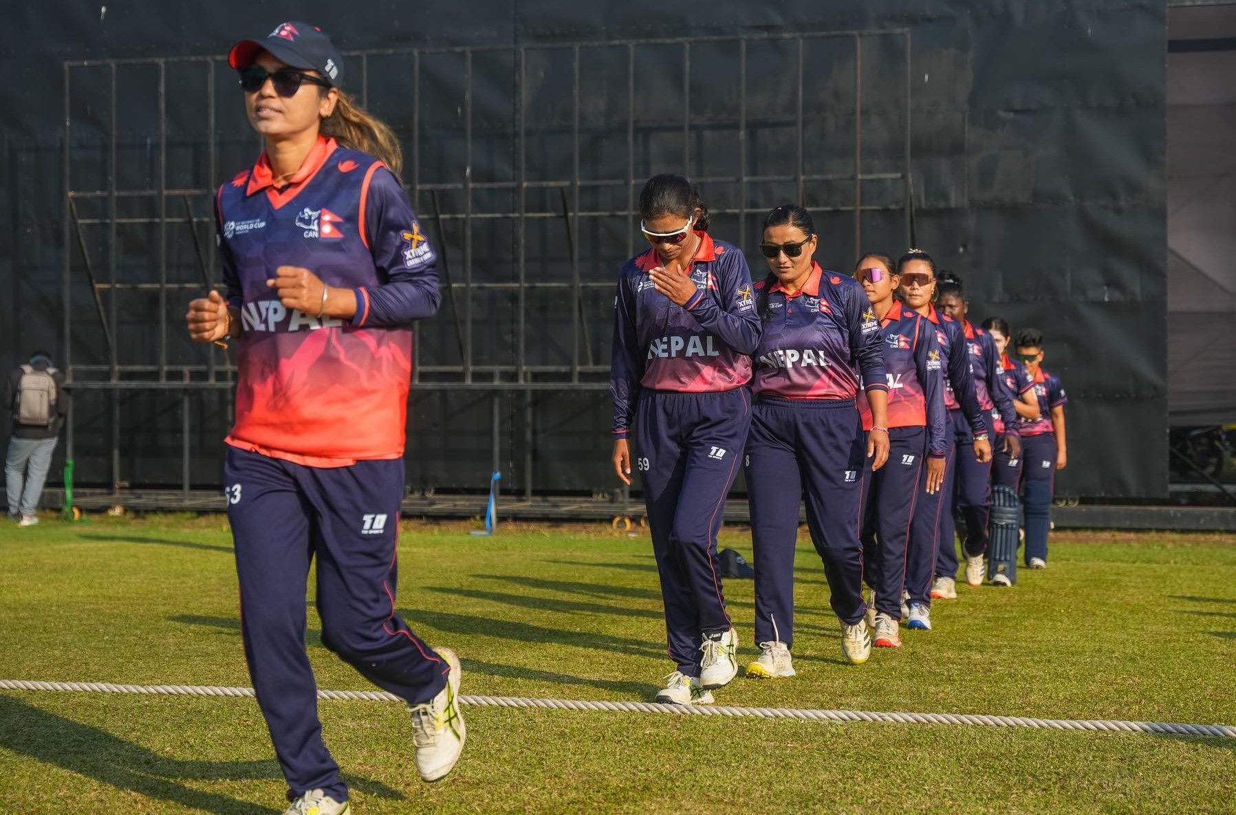 Action shot from the Nepal vs Netherlands women's T20 cricket match in ICC Qualifier.