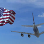 Planes grounded at an airport covered in snow during the US Winter Storm.