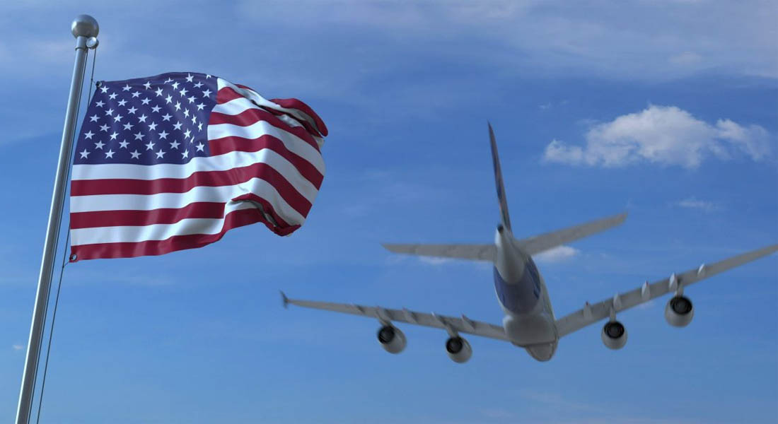 Planes grounded at an airport covered in snow during the US Winter Storm.